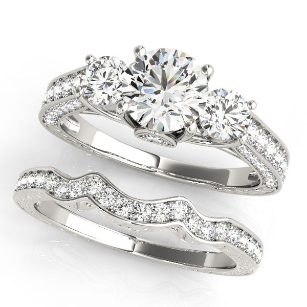 Round Diamond Three Stone Engagement Ring