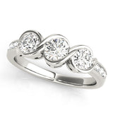 Round Diamond Three Stone Engagement Ring