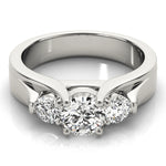 Round Diamond Three Stone Engagement Ring