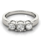 Round Diamond Three Stone Engagement Ring